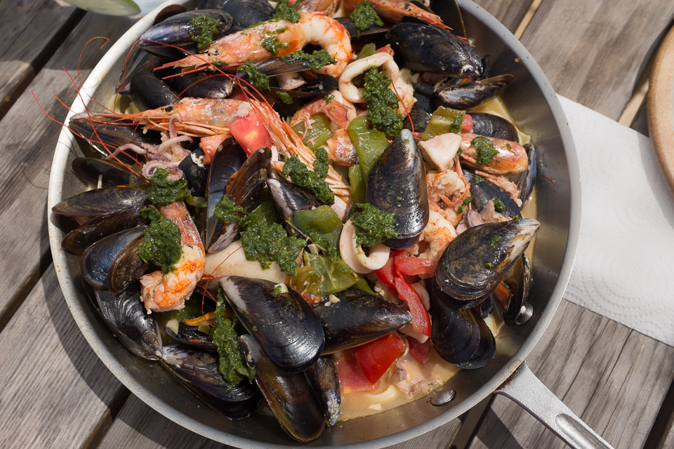 fresh seafood with pasta and green harissa