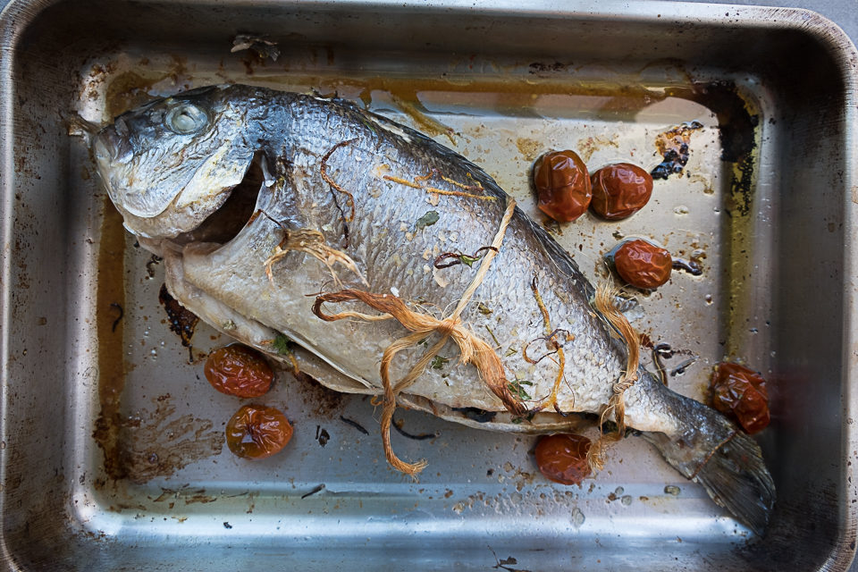 Baked sea bream with black garlic