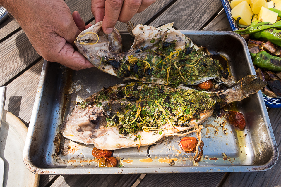 Oven baked se bream with herbs and black garlic
